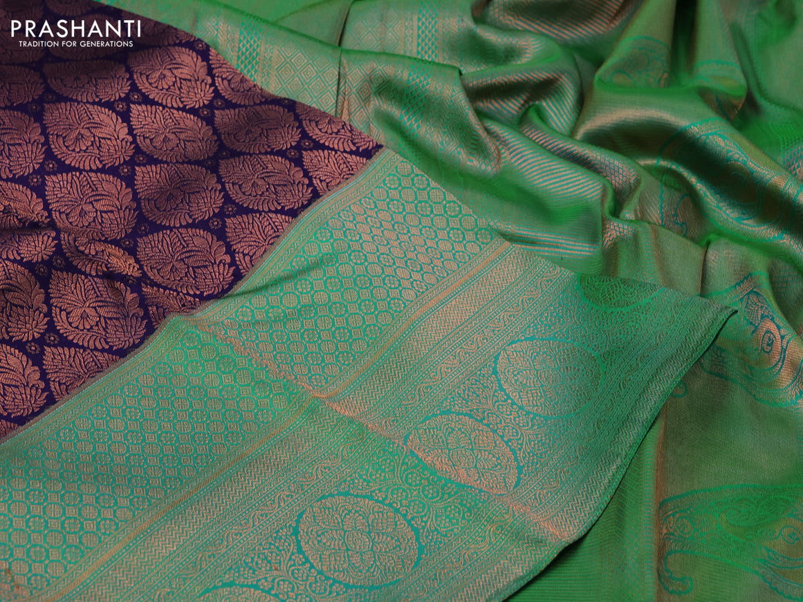 Pure kanchipuram silk saree dark blue and green with copper zari woven brocade weaves and long zari woven border