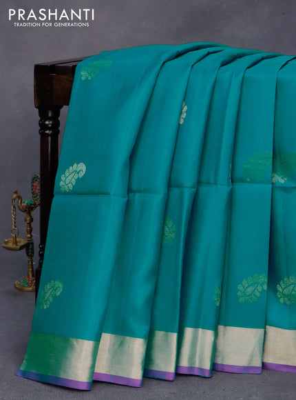 Pure soft silk saree teal blue shade and magenta with zari woven buttas and zari woven border