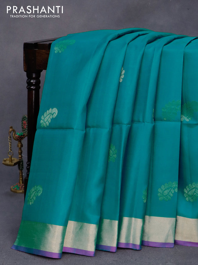 Pure soft silk saree teal blue shade and magenta with zari woven buttas and zari woven border