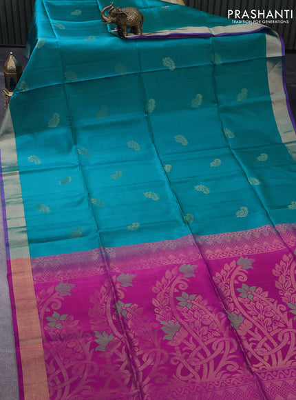 Pure soft silk saree teal blue shade and magenta with zari woven buttas and zari woven border