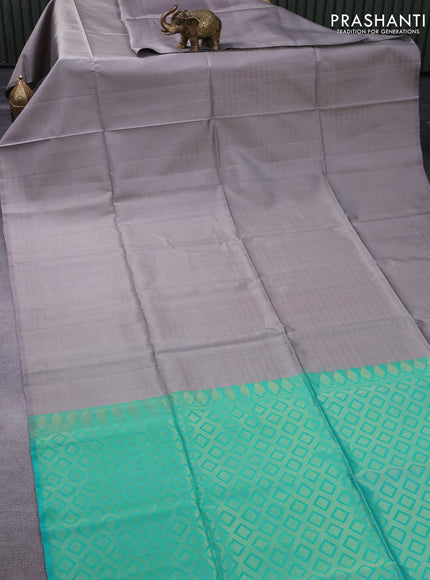 Pure soft silk saree grey and teal blue with allover zari weaves in borderless style