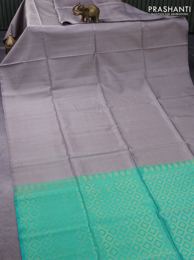 Pure soft silk saree grey and teal blue with allover zari weaves in borderless style