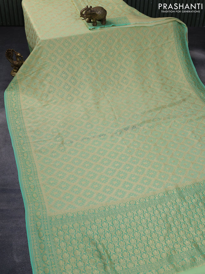 Banarasi georgette silk saree pista green and teal green with allover zari weaves and zari woven border