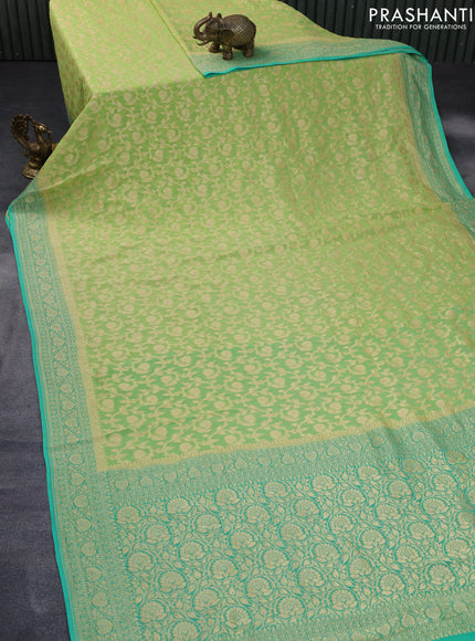 Banarasi georgette silk saree pista green and teal green with allover zari weaves and zari woven border