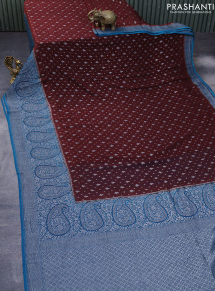 Banarasi georgette silk saree brown and cs blue with allover thread & zari weaves and long woven border