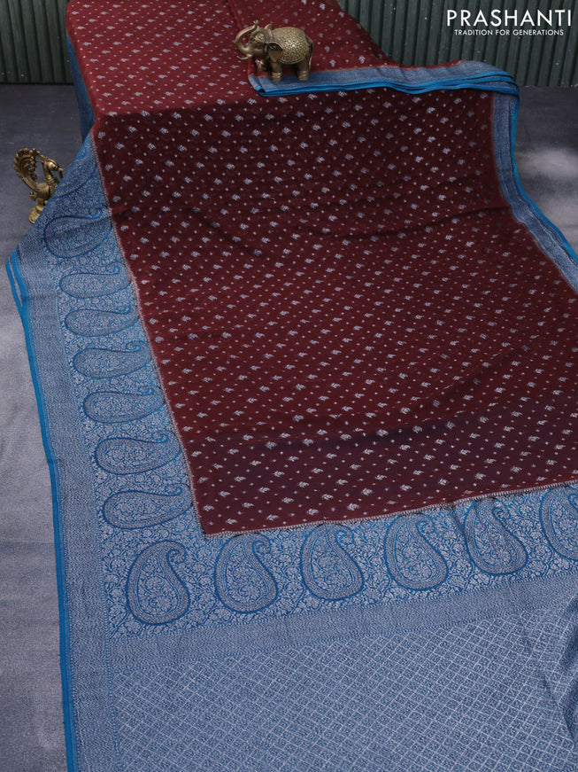 Banarasi georgette silk saree brown and cs blue with allover thread & zari weaves and long woven border