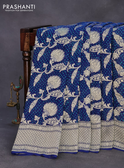 Banarasi georgette silk saree peacock blue with allover zari weaves & bandhani prints and zari woven border