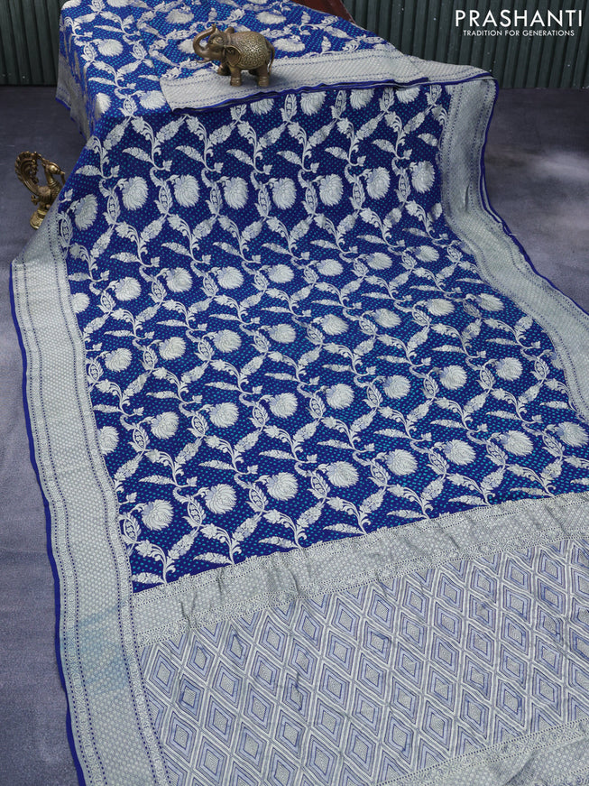 Banarasi georgette silk saree peacock blue with allover zari weaves & bandhani prints and zari woven border