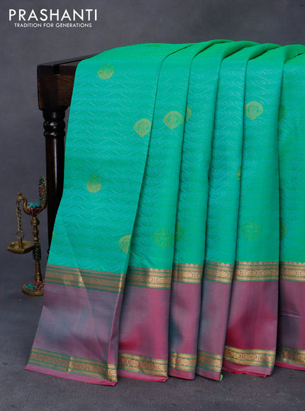 Pure kanchipuram silk saree light green and dual shade of pink with allover self emboss & zari buttas and rettapet zari woven border