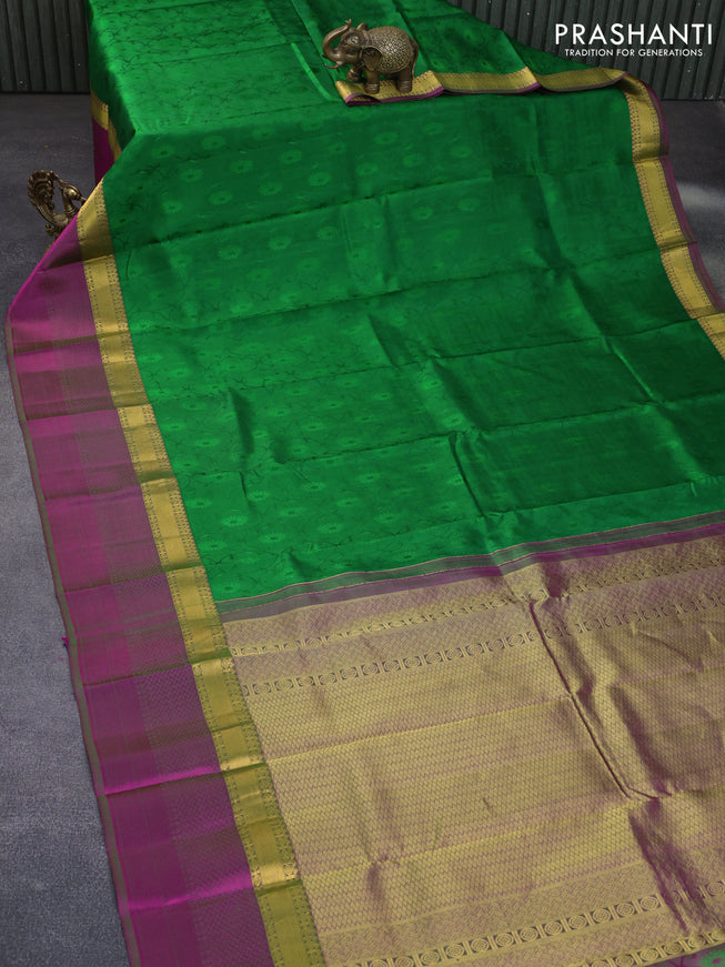 Pure kanchipuram silk saree green and dual shade of pink with allover self emboss and zari woven simple border