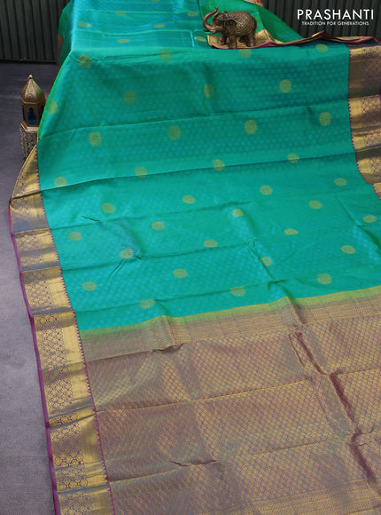 Pure kanchipuram silk saree green and dual shade of pink with allover self emboss & zari buttas and zari woven border