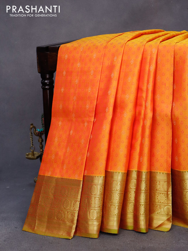 Pure kanchipuram silk saree dual shade of mustard and light green with allover self emboss and zari woven border