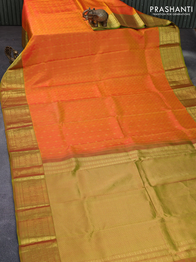 Pure kanchipuram silk saree dual shade of mustard and light green with allover self emboss and zari woven border