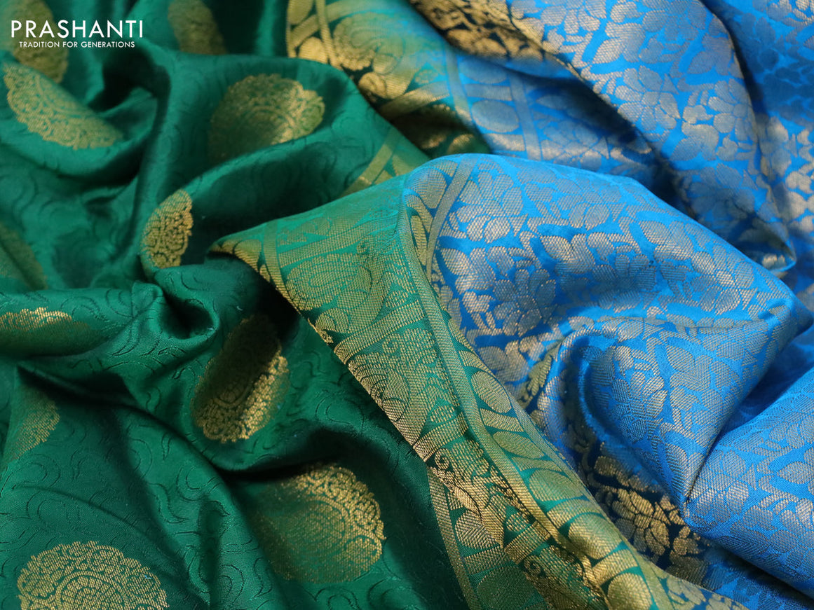 Pure kanchipuram silk saree green and cs blue with allover self emboss & zari buttas and zari woven border