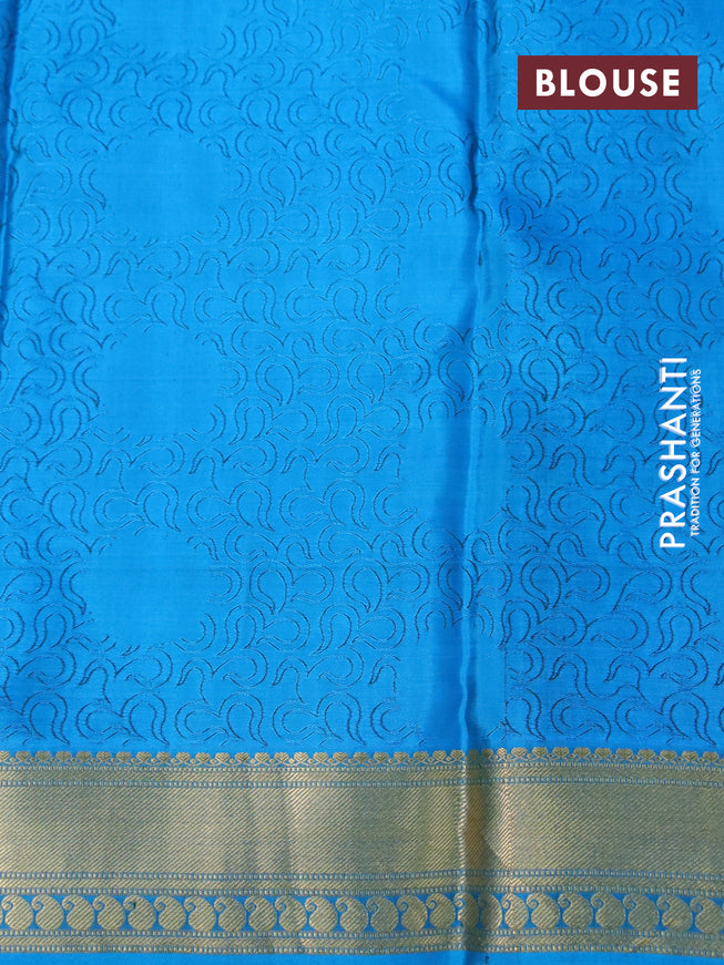 Pure kanchipuram silk saree green and cs blue with allover self emboss & zari buttas and zari woven border