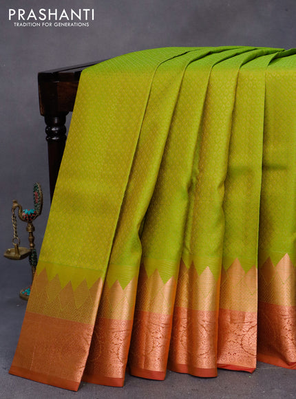 Pure kanchipuram silk saree light green and maroon with allover self emboss and temple design copper zari woven border