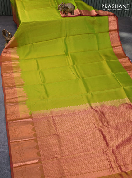 Pure kanchipuram silk saree light green and maroon with allover self emboss and temple design copper zari woven border