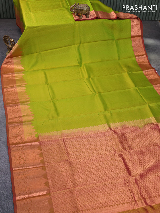 Pure kanchipuram silk saree light green and maroon with allover self emboss and temple design copper zari woven border