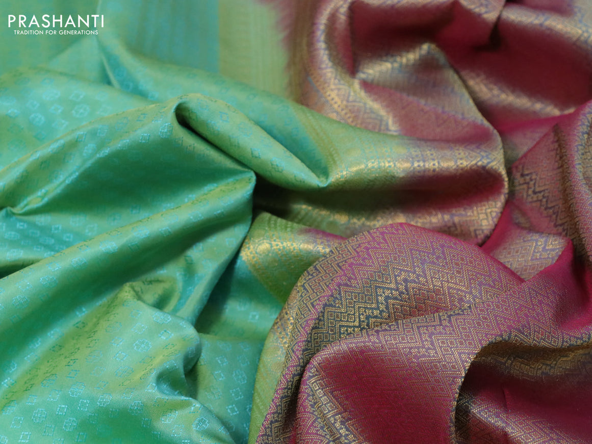 Pure kanchipuram silk saree teal green shade and dual shade of pink with allover self emboss and zari woven border