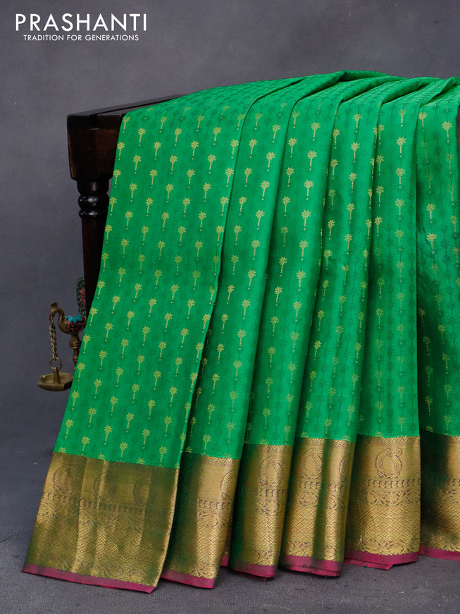 Pure kanchipuram silk saree green and pink with allover self emboss & zari buttas and zari woven border