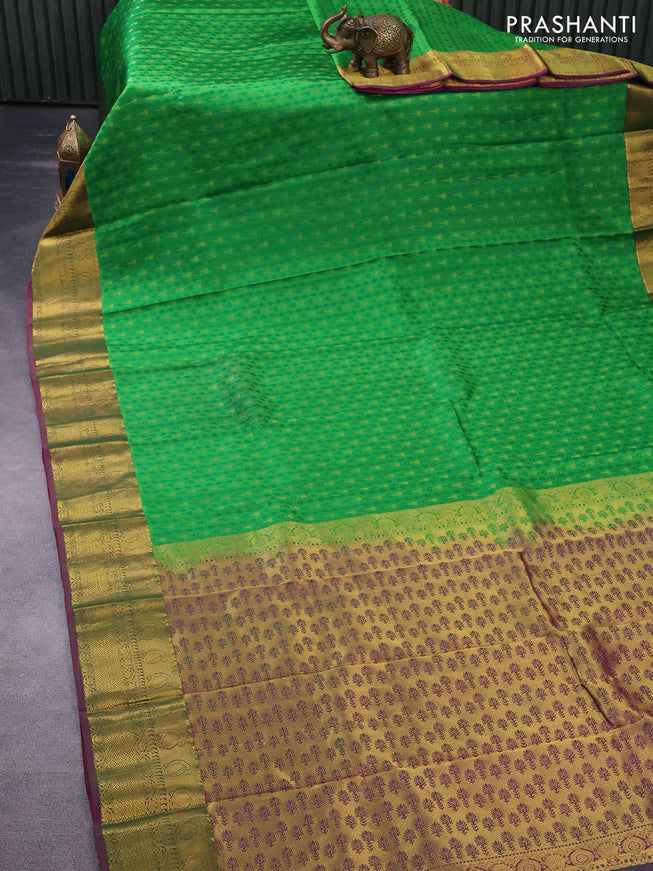 Pure kanchipuram silk saree green and pink with allover self emboss & zari buttas and zari woven border