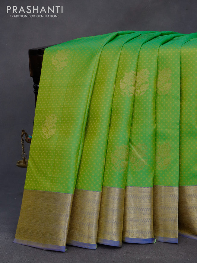 Pure kanchipuram silk saree light green and pink with allover self emboss and zari woven border