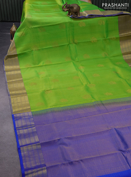 Pure kanchipuram silk saree light green and pink with allover self emboss and zari woven border