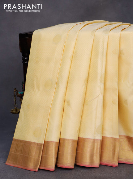 Pure kanchipuram silk saree pale yellow and pink with allover self emboss & zari buttas and zari woven border