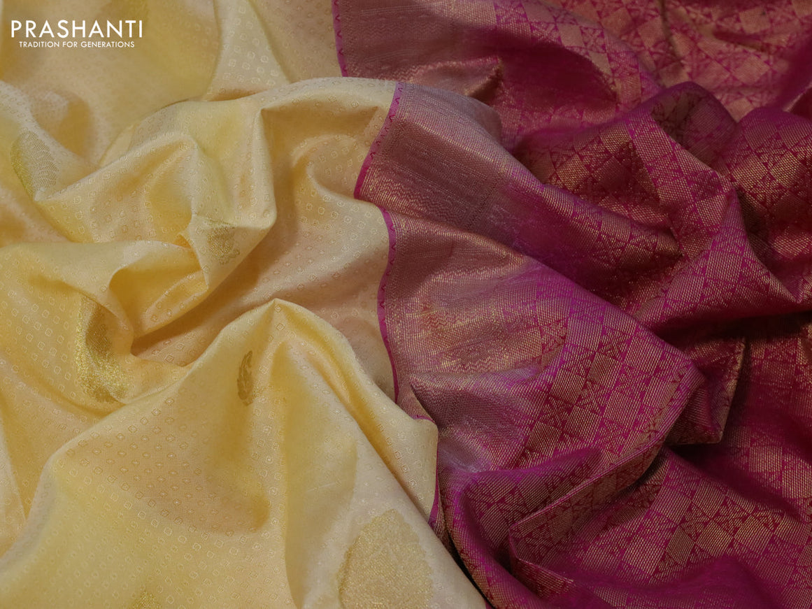 Pure kanchipuram silk saree pale yellow and pink with allover self emboss & zari buttas and zari woven border