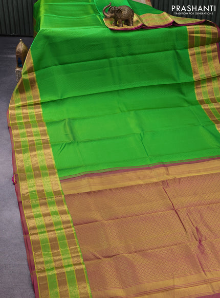 Pure kanchipuram silk saree light green and pink with allover self emboss and zari woven border