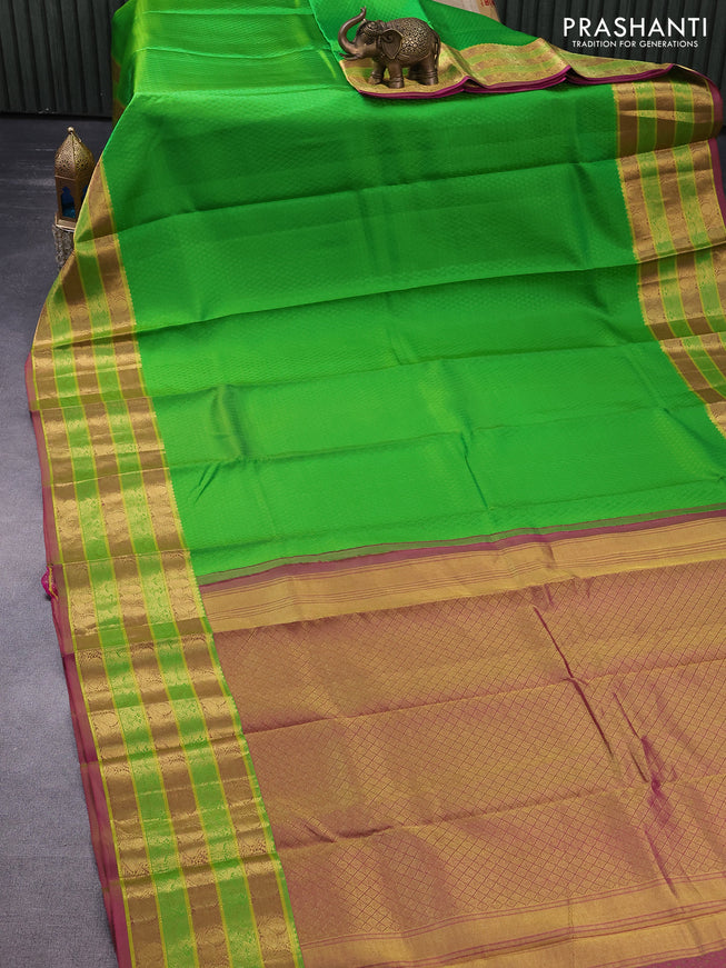 Pure kanchipuram silk saree light green and pink with allover self emboss and zari woven border