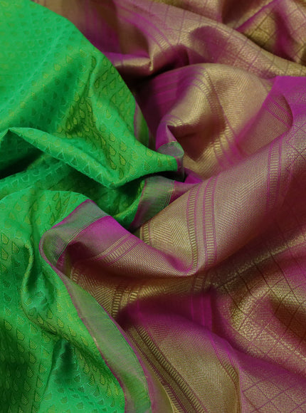 Pure kanchipuram silk saree light green and pink with allover self emboss and zari woven border