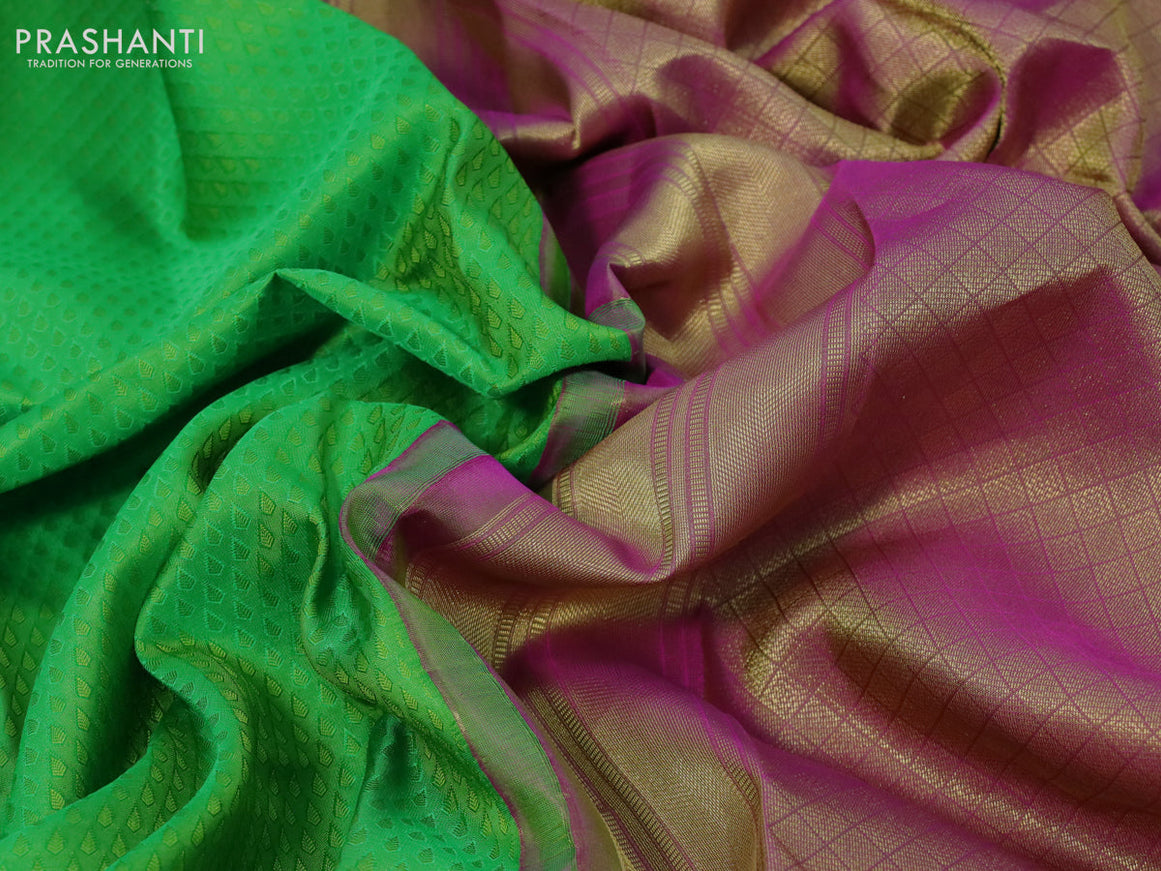 Pure kanchipuram silk saree light green and pink with allover self emboss and zari woven border