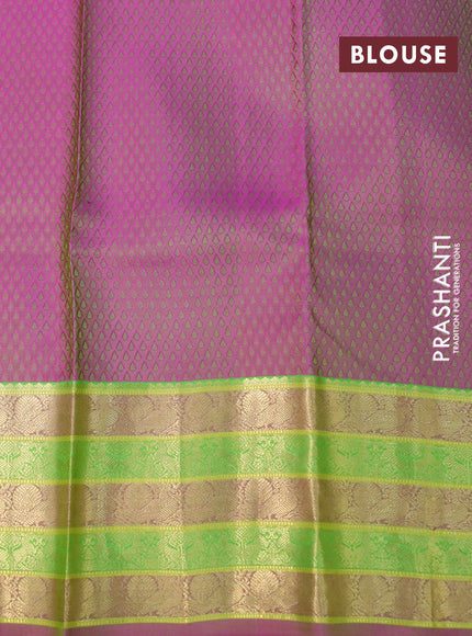 Pure kanchipuram silk saree light green and pink with allover self emboss and zari woven border