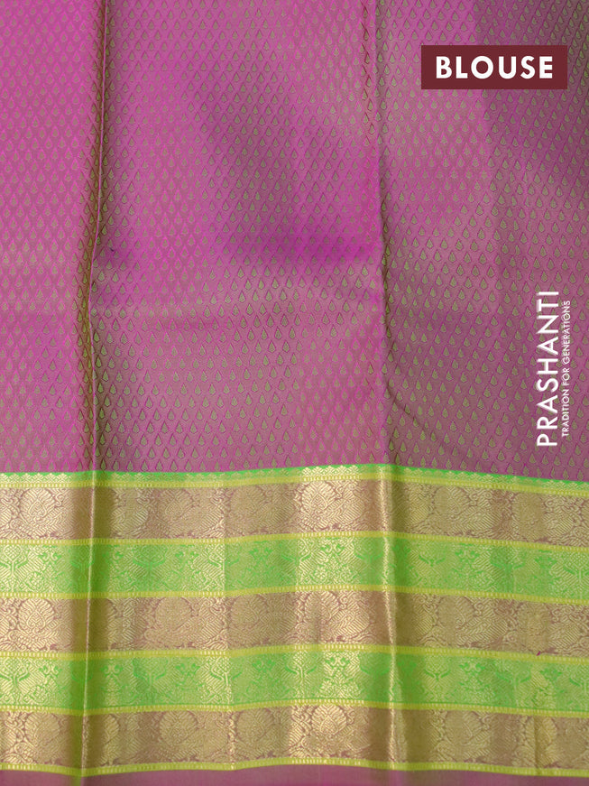 Pure kanchipuram silk saree light green and pink with allover self emboss and zari woven border