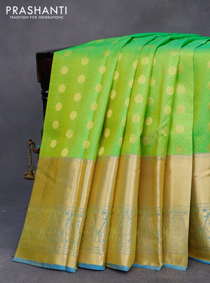 Pure kanchipuram silk saree light green and cs blue with allover self emboss and zari woven border