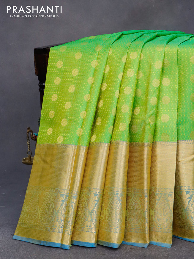 Pure kanchipuram silk saree light green and cs blue with allover self emboss and zari woven border