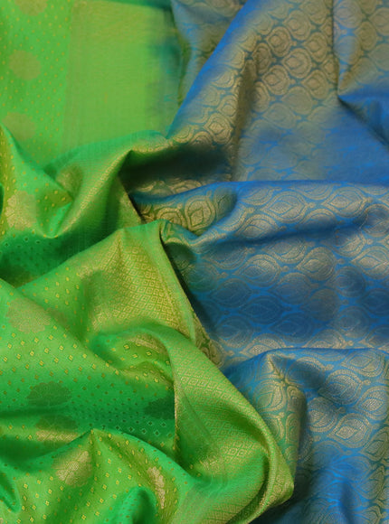 Pure kanchipuram silk saree light green and cs blue with allover self emboss and zari woven border