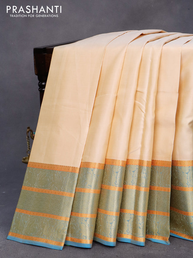 Pure kanchipuram silk saree sanfdal and cs blue with plain body and zari woven border