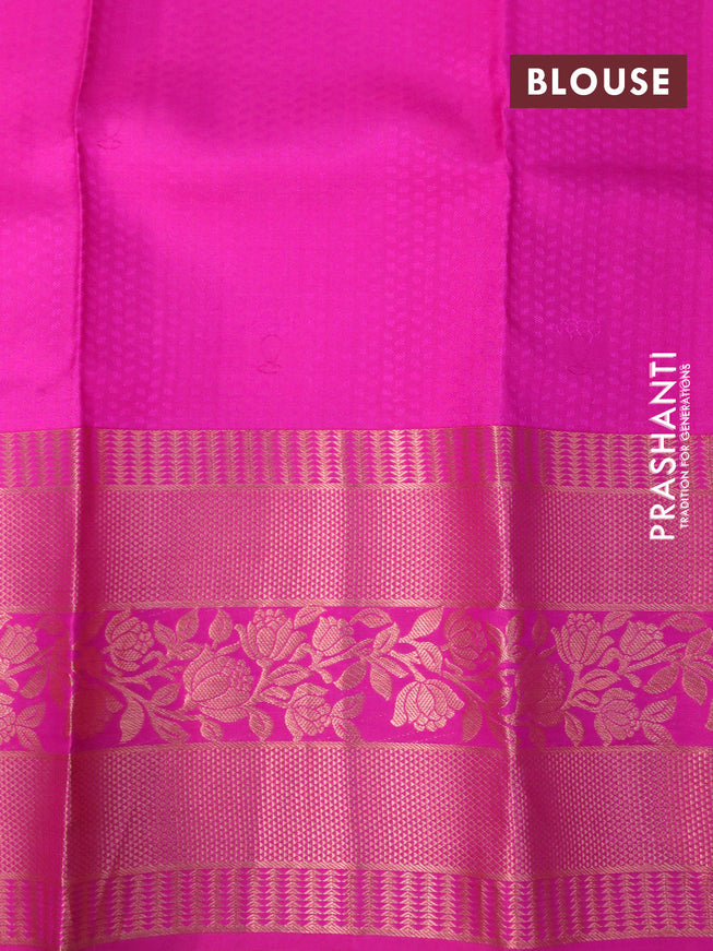 Pure kanchipuram silk saree light green and pink with allover self emboss & zari buttas and long copper zari woven border