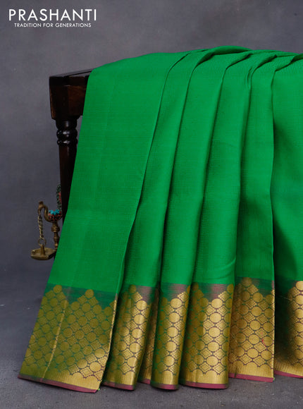 Pure kanchipuram silk saree green and pink with allover self emboss and zari woven border