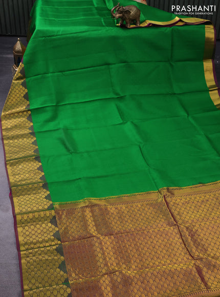 Pure kanchipuram silk saree green and pink with allover self emboss and zari woven border