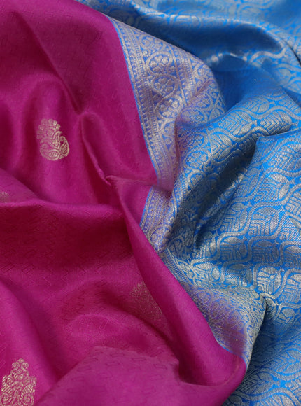 Pure kanchipuram silk saree pink and cs blue with allover self emboss & zari buttas and zari woven border