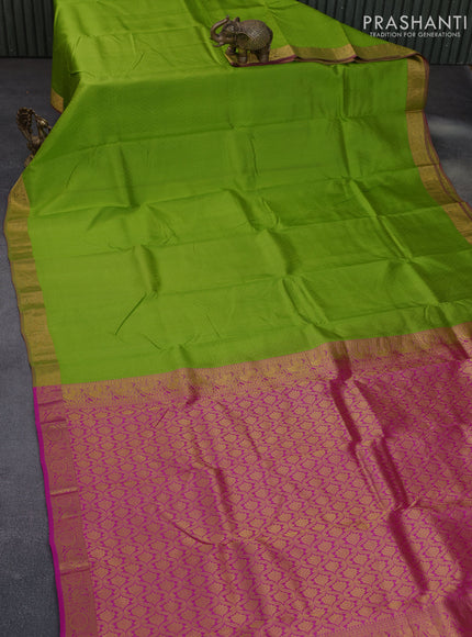 Pure kanchipuram silk saree light green and pink with allover self emboss and zari woven border