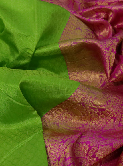 Pure kanchipuram silk saree light green and pink with allover self emboss and zari woven border