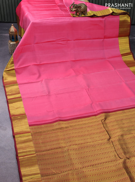 Pure kanchipuram silk saree pink and maroon with allover self emboss and zari woven border