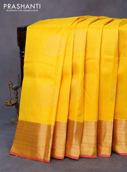 Pure kanchipuram silk saree mango yellow and pink with allover self emboss & zari buttas and zari woven border