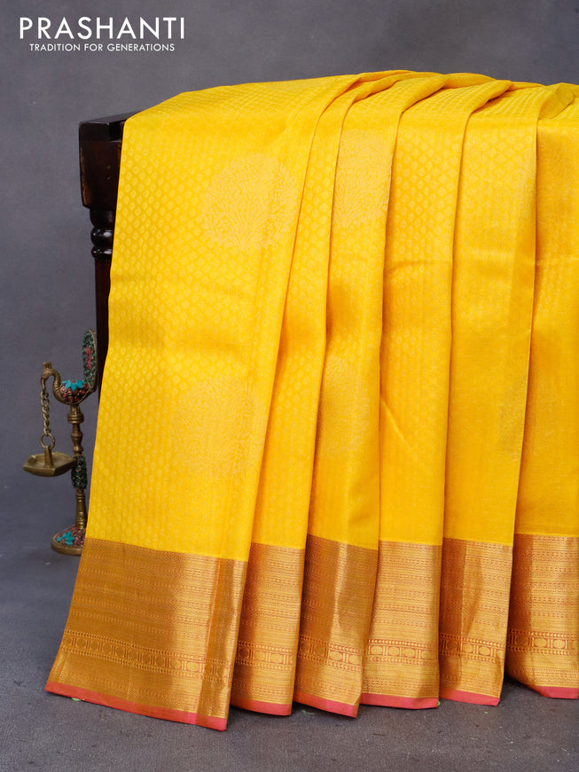 Pure kanchipuram silk saree mango yellow and pink with allover self emboss & zari buttas and zari woven border