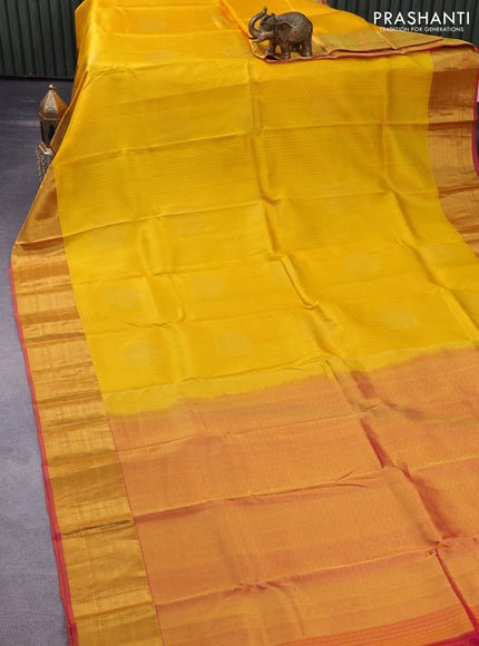 Pure kanchipuram silk saree mango yellow and pink with allover self emboss & zari buttas and zari woven border