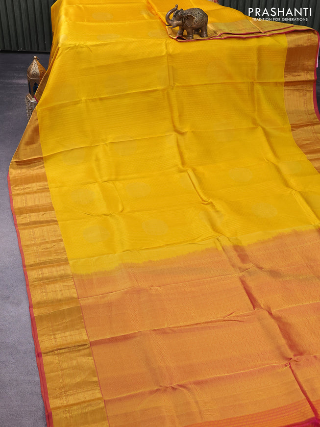 Pure kanchipuram silk saree mango yellow and pink with allover self emboss & zari buttas and zari woven border